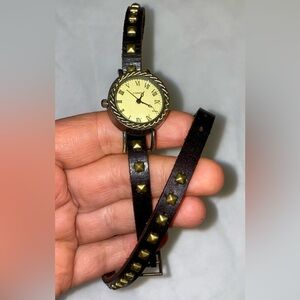 Old wristwatch with a leather band